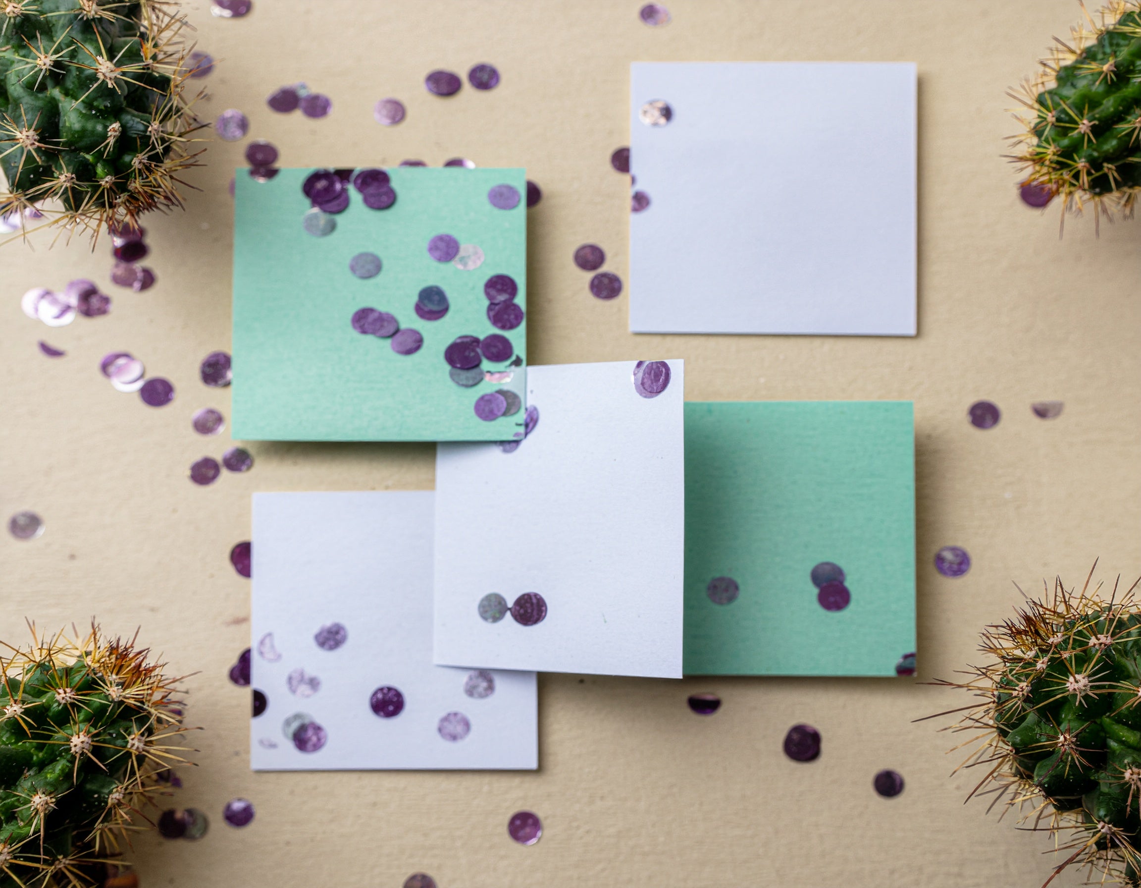 Minimal, playful header showing blank A6 card shapes in cactus-green, mint and purple tones on an off-white background—bold, modern style reminiscent of Prickly Cards
