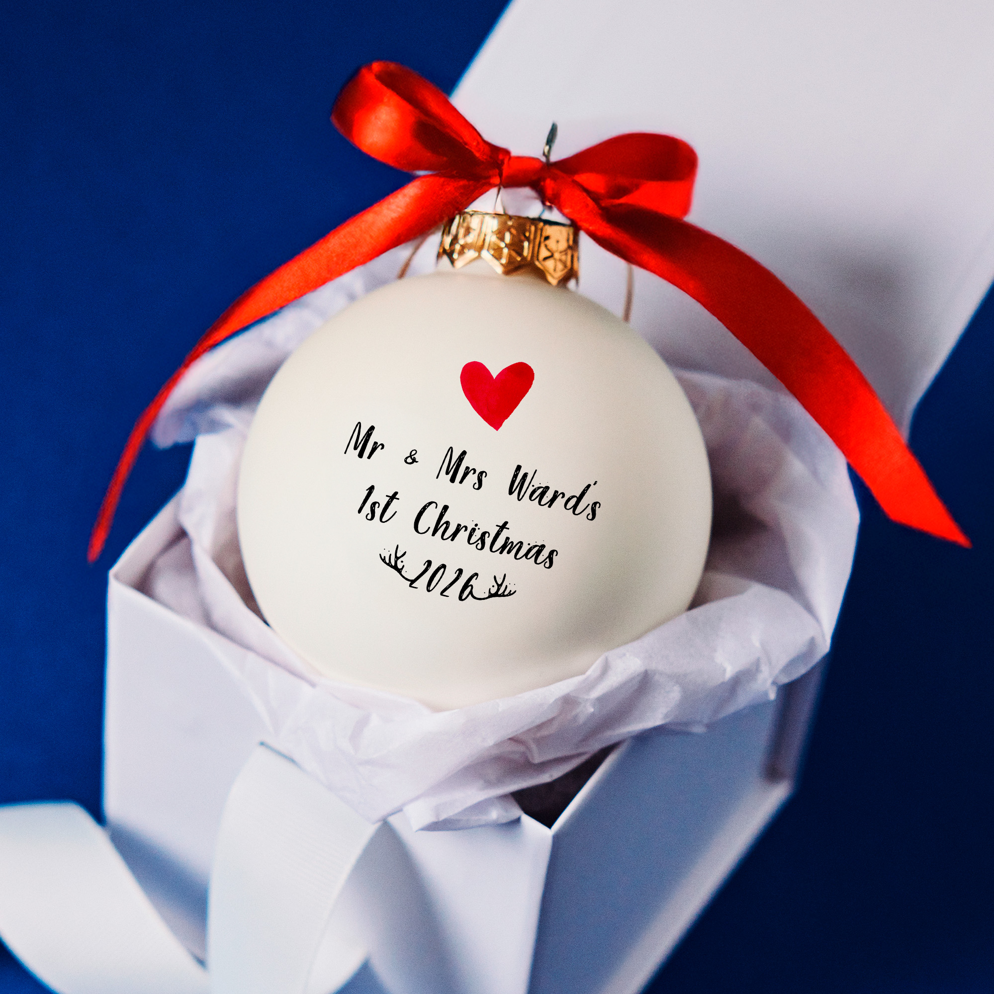 Personalised Mr & Mrs 1st Christmas white glass bauble with red heart and bow, presented in a luxury white gift box – perfect newlywed Christmas keepsake