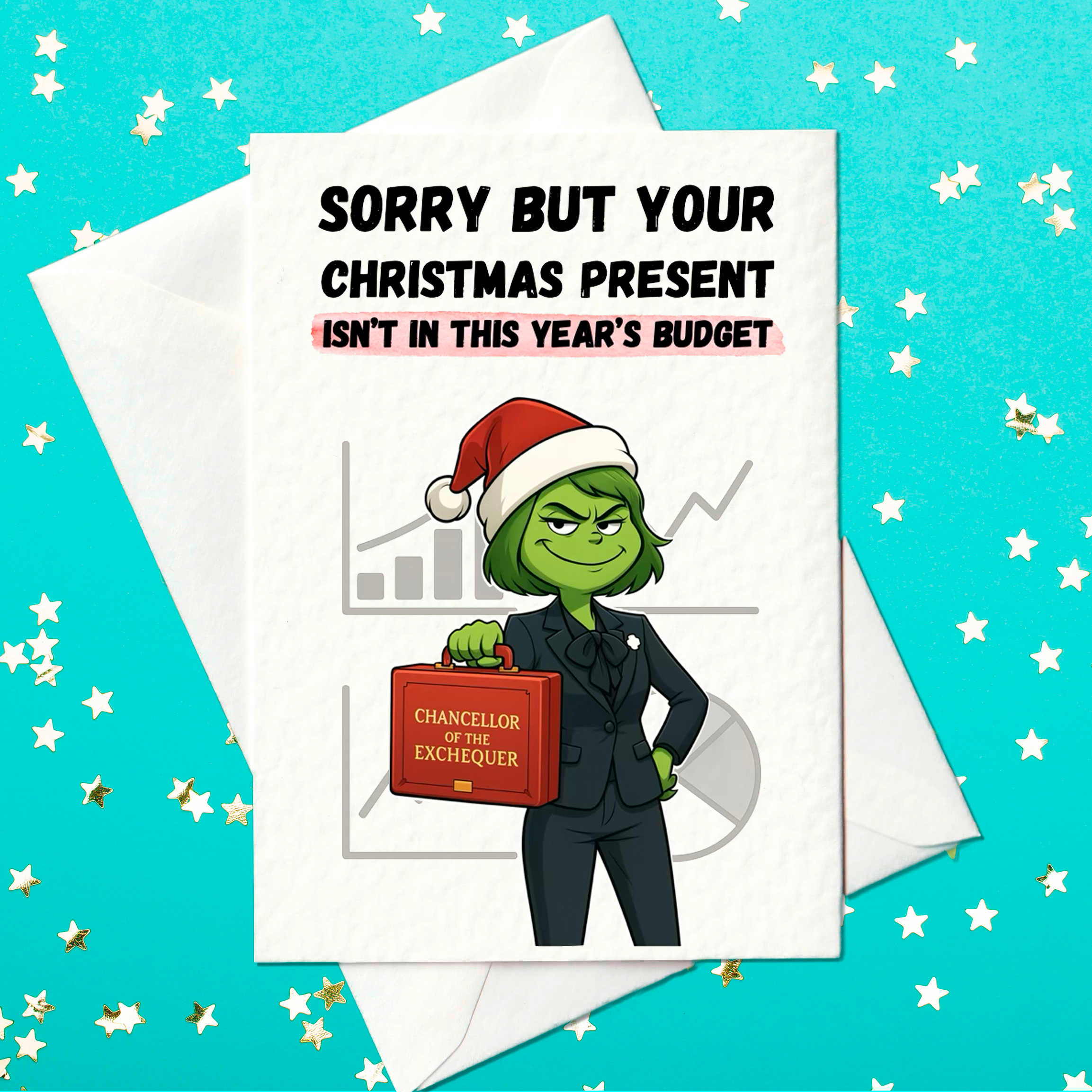 Funny political Christmas card with a cartoon chancellor in a Santa hat holding a red ‘Chancellor of the Exchequer’ box and the text ‘Sorry but your Christmas present isn’t in this year’s budget.’ White A6 card on teal background with star confetti.
