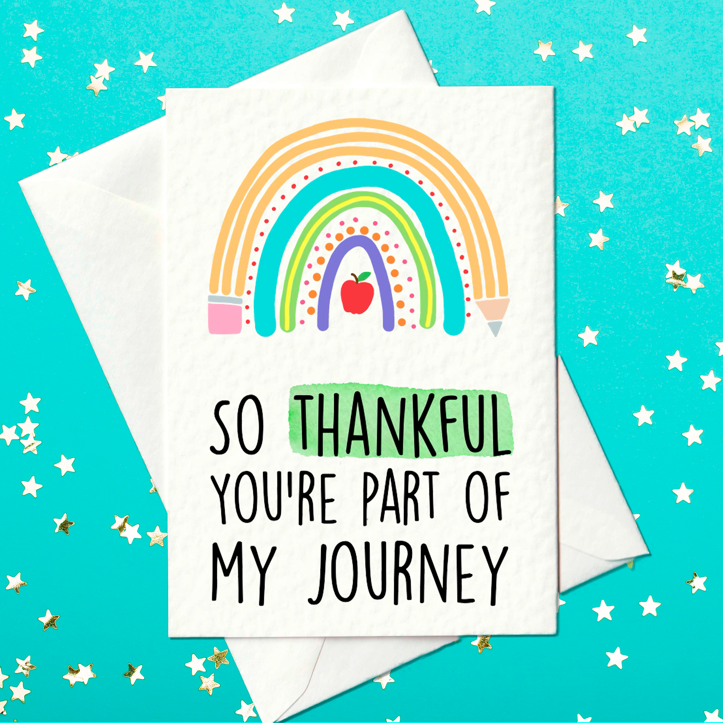Rainbow teacher thank you card with pencils, paint and apple design, featuring the message 'So thankful you're part of my journey' on a white card.
