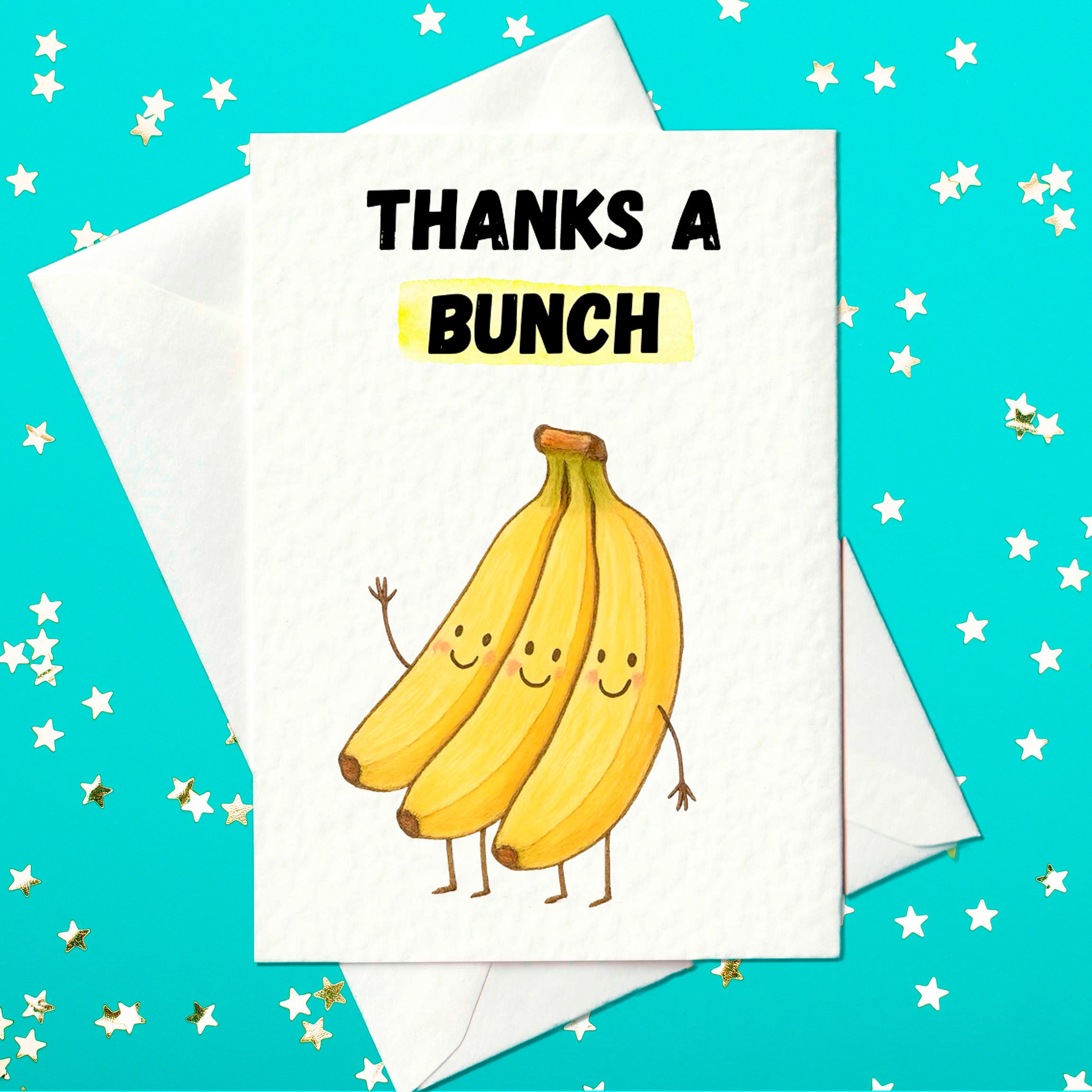 A fun thank you card featuring a smiling illustrated bunch of three bananas with arms and legs, under the text “Thanks a Bunch” in bold black letters.