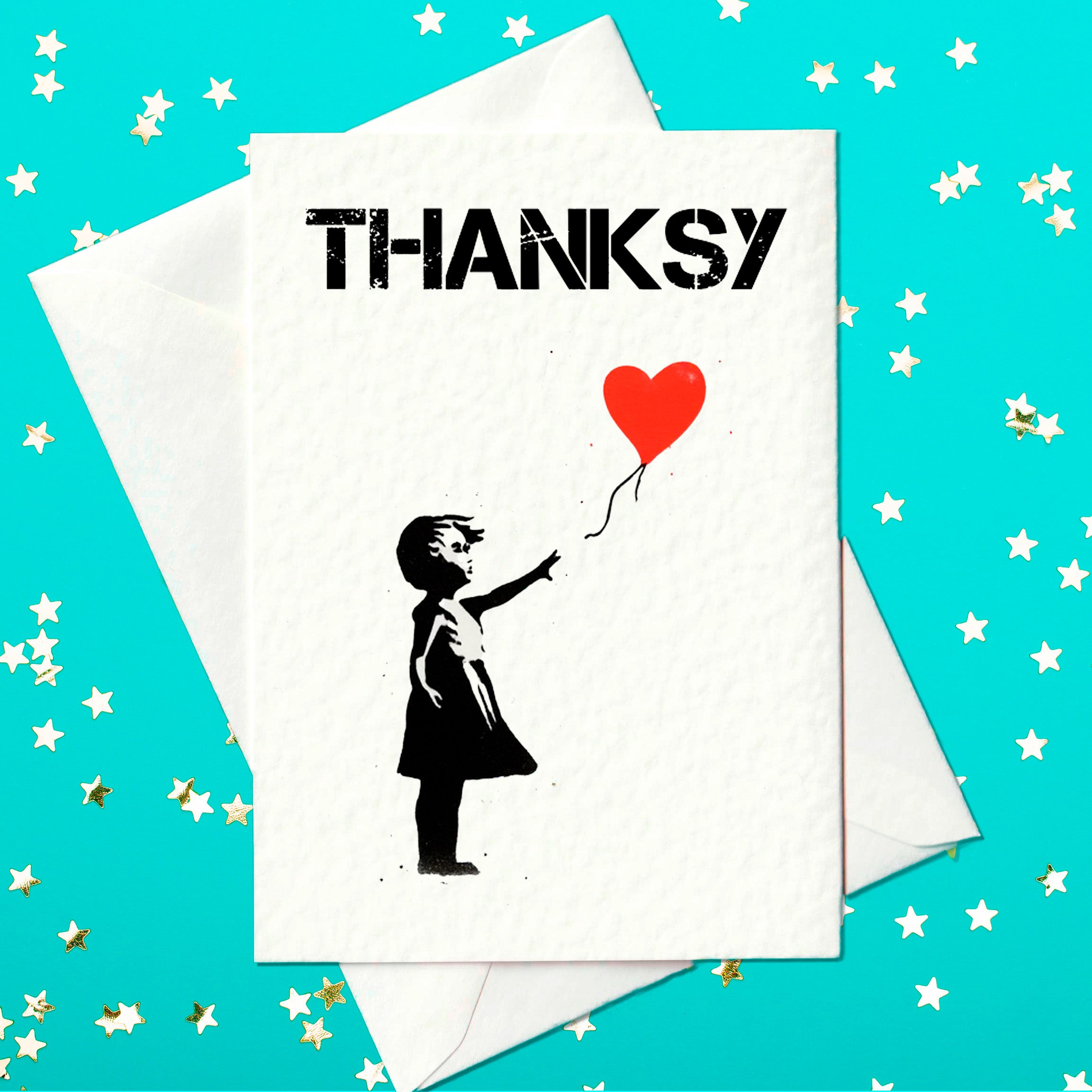 Funny thank you card featuring a Banksy-style stencil of a girl reaching for a red heart balloon, with the word “THANKSY” in bold, distressed lettering above.