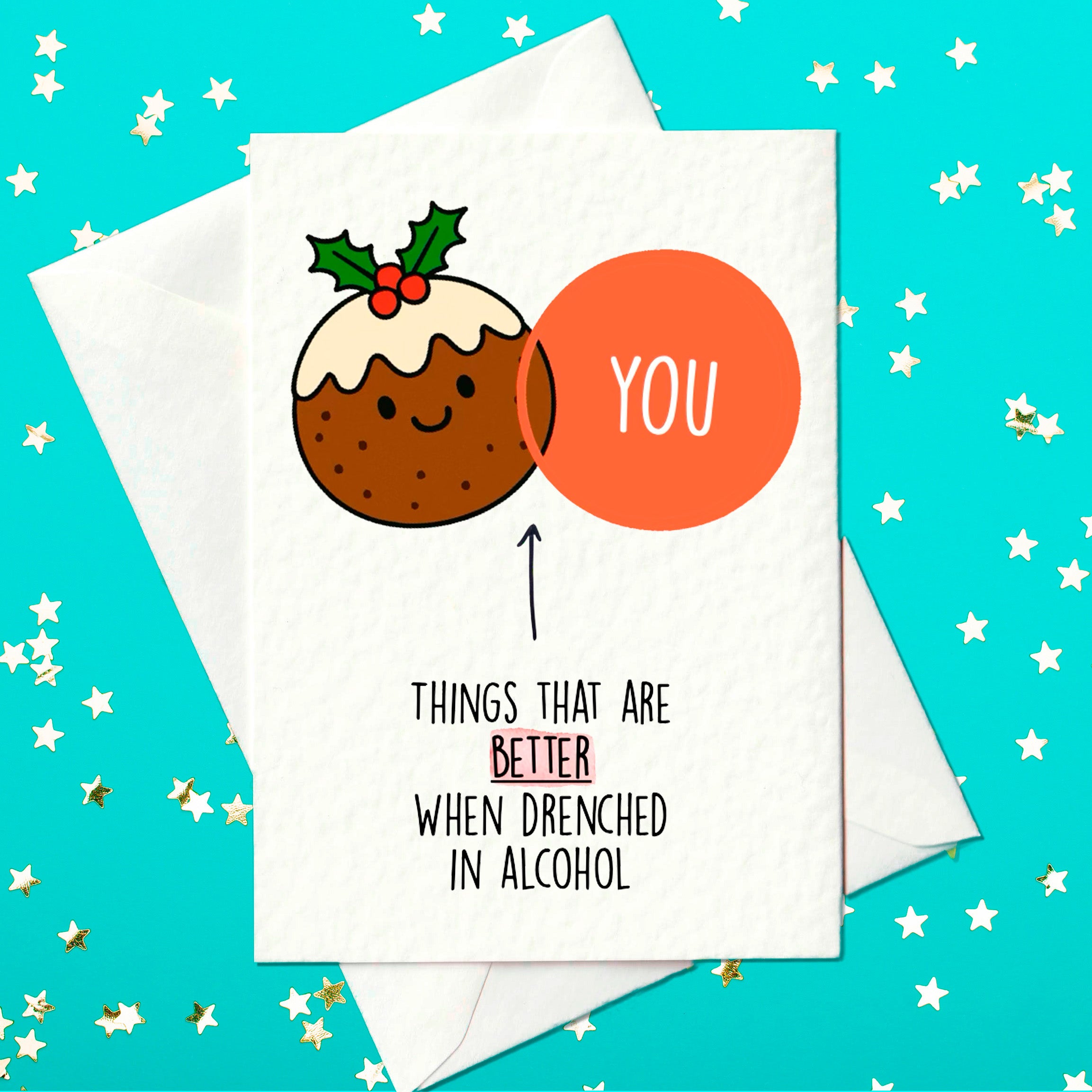 Funny Christmas card featuring a smiling Christmas pudding with holly on top and the words “Things that are better when drenched in alcohol – You.”
