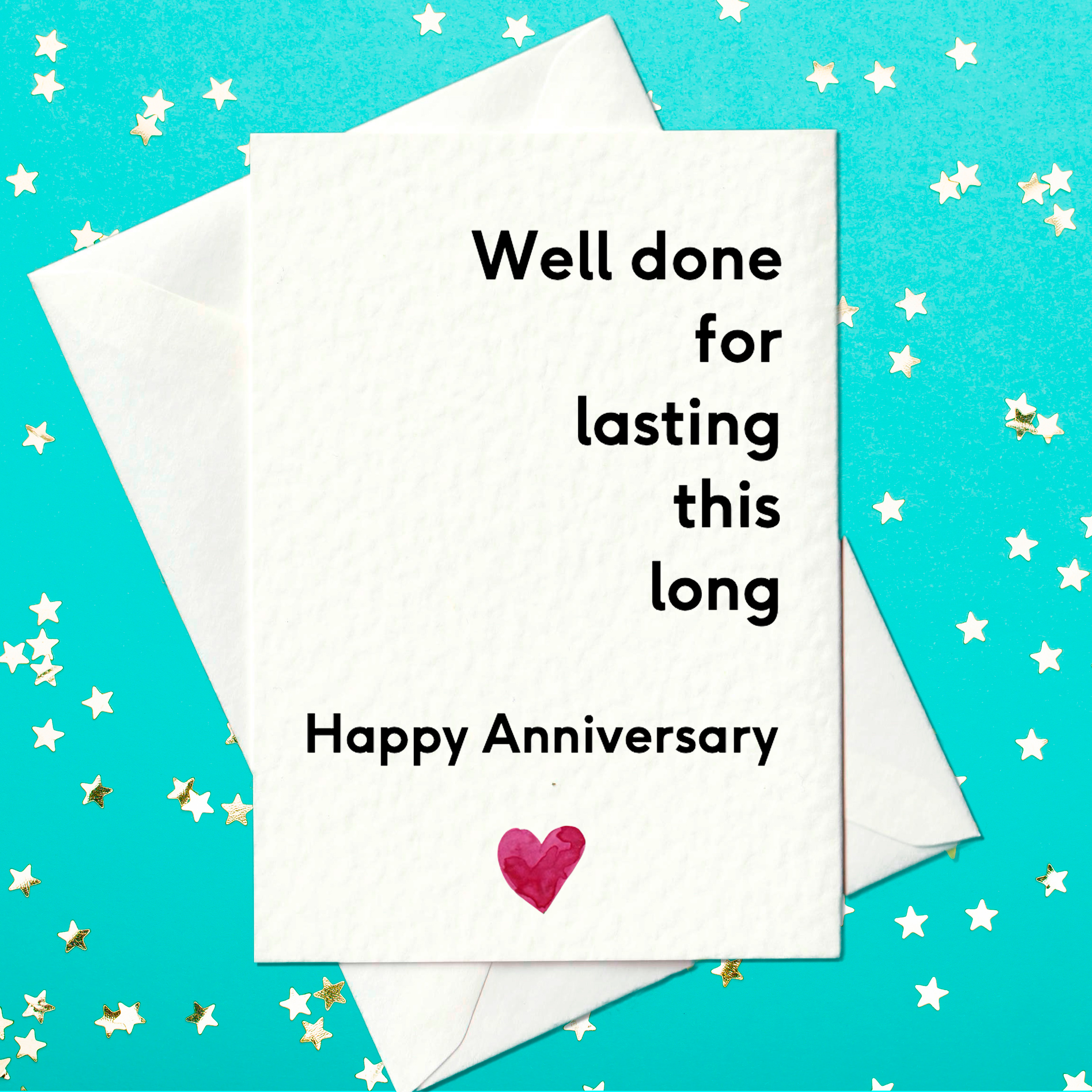 Well done for lasting this long happy anniversary card with a small heart on it