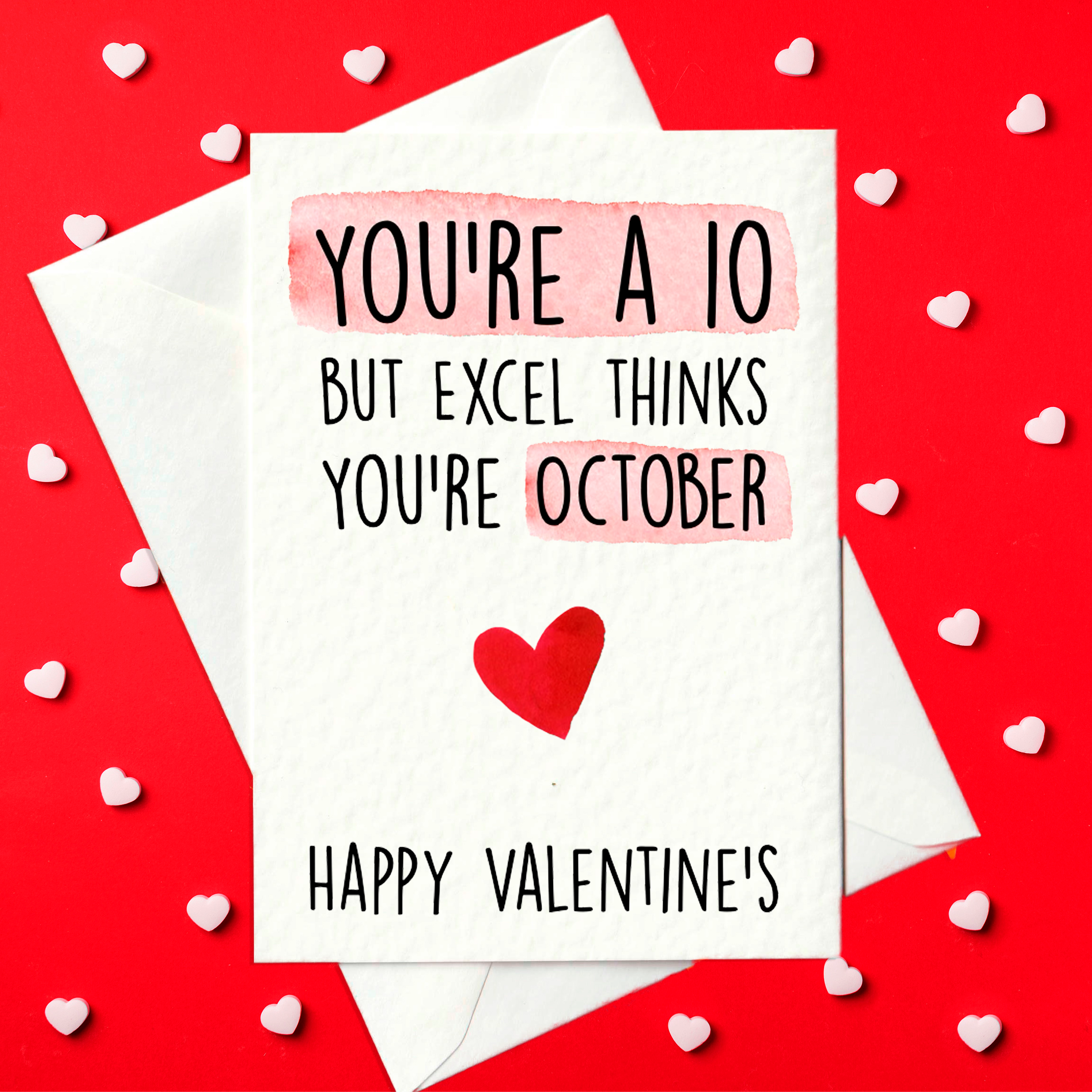 A6 Valentine’s card with pink highlights reading “You’re a 10 but Excel thinks you’re October” and “Happy Valentine’s”, with a small red heart; blank inside with envelope.