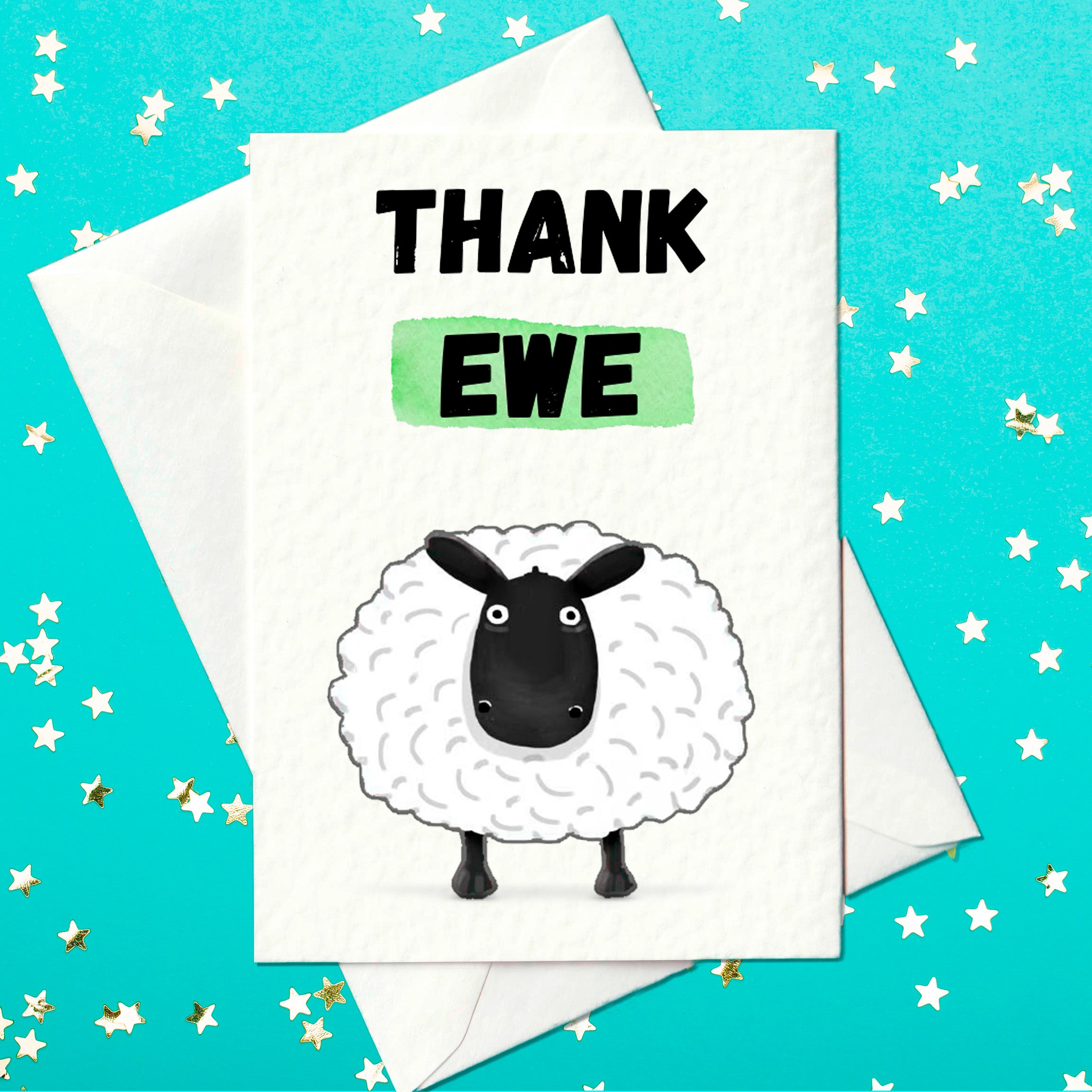 Humorous thank you card with a cartoon sheep and the pun "Thank Ewe" on a textured white background, displayed with envelope on a turquoise star background.